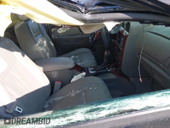 2007 GMC Envoy Denali with VIN 1GKET63M072227691, listed as a IAAI auction lot 41612371 with 154,001 mi miles. Bid and sale history available at carsss.com. Image 5.