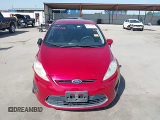 2012 Ford Fiesta SE z VIN 3FADP4EJ9CM140948, wystawiony jako IAAI lot #42301818 z przebiegiem 109 276 mil mil oraz . Historia ofert i sprzedaży dostępna na DreamBid. Obrazek 13.