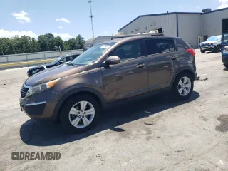 2012 Kia Sportage LX with VIN KNDPB3A20C7276250, listed as a Copart auction lot 61804995 with 112,303 mi miles and Salvage title. Bid and sale history available at DreamBid. Image 1.