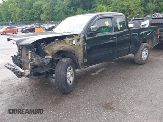 2018 Toyota Tacoma SR with VIN 5TFSX5EN1JX062523, listed as a IAAI auction lot 42334816 with 56,994 mi miles and . Bid and sale history available at DreamBid. Image 2.