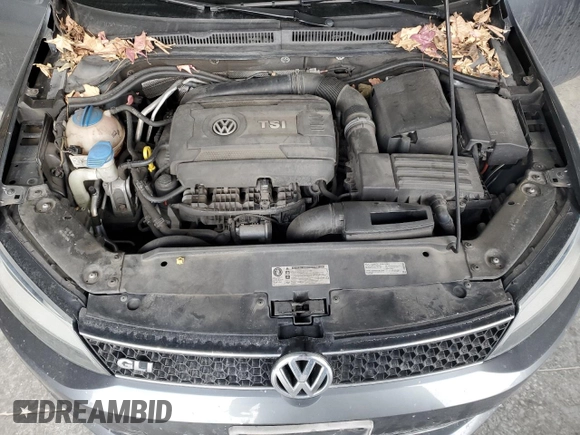 2014 Volkswagen Jetta GLI z VIN 3VW4T7AJ6EM398115, wystawiony jako Copart lot #89179925 z przebiegiem 81 264 mil mil oraz Szkoda całkowita • Salvage title. Historia ofert i sprzedaży dostępna na DreamBid. Obrazek 12.