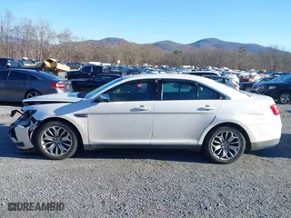 2013 Ford Taurus Limited with VIN 1FAHP2F82DG131585, listed as a IAAI auction lot 41076163 with 134,916 mi miles. Bid and sale history available at carsss.com. Image 15.