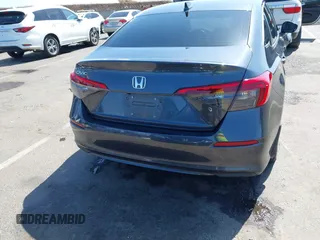 2023 Honda Civic EX with VIN 2HGFE1F74PH323979, listed as a IAAI auction lot 42499373 with 70,326 mi miles and . Bid and sale history available at DreamBid. Image 16.