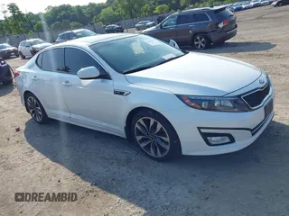 2015 Kia Optima SXL Turbo z VIN 5XXGR4A6XFG469571, wystawiony jako IAAI lot #42484269 z przebiegiem 94 372 mil mil oraz . Historia ofert i sprzedaży dostępna na DreamBid. Obrazek 1.