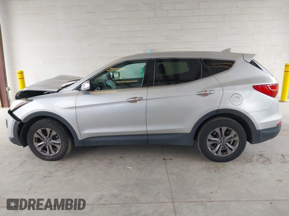 2016 Hyundai Santa Fe z VIN 5XYZTDLB6GG319216, wystawiony jako IAAI lot #41949595 z przebiegiem 132 463 mil mil oraz . Historia ofert i sprzedaży dostępna na DreamBid. Obrazek 14.