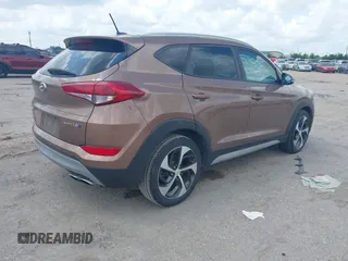 2017 Hyundai Tucson Value with VIN KM8J33A27HU430198, listed as a IAAI auction lot 42104369 with 163,929 mi miles and . Bid and sale history available at DreamBid. Image 4.