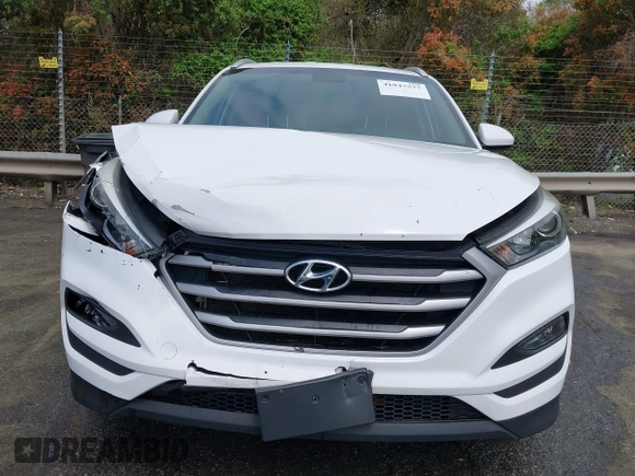2017 Hyundai Tucson SE z VIN KM8J33A40HU383601, wystawiony jako IAAI lot #41947577 z przebiegiem 92 722 mil mil oraz . Historia ofert i sprzedaży dostępna na DreamBid. Obrazek 12.
