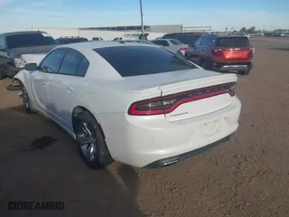 2015 Dodge Charger SE with VIN 2C3CDXBG5FH879783, listed as a IAAI auction lot 41500193 with 83,386 mi miles. Bid and sale history available at carsss.com. Image 3.