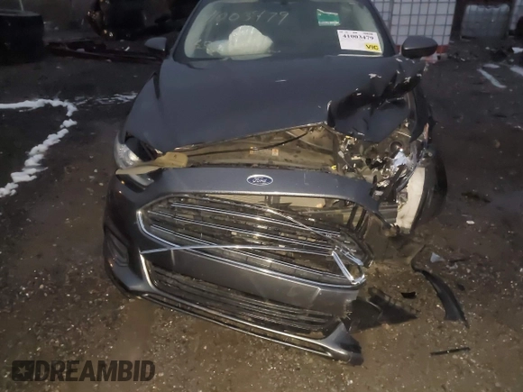 2015 Ford Fusion S Hybrid with VIN 3FA6P0UU2FR102241, listed as a IAAI auction lot 41003479 with 88,020 mi miles. Bid and sale history available at carsss.com. Image 6.