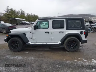 2021 Jeep Wrangler Unlimited Sport Altitude with VIN 1C4HJXDG2MW791599, listed as a IAAI auction lot 41235427 with 47,220 mi miles and . Bid and sale history available at DreamBid. Image 15.