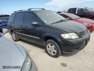 2001 Mazda MPV DX with VIN JM3LW28G310173674, listed as a Copart auction lot 75312034 with 0 mi miles and Salvage Title. Bid and sale history available at carsss.com. Image 4.