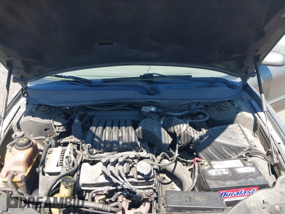 2002 Mercury Sable GS z VIN 1MEFM50U92G639145, wystawiony jako IAAI lot #42373493 z przebiegiem 193 318 mil mil oraz . Historia ofert i sprzedaży dostępna na DreamBid. Obrazek 10.