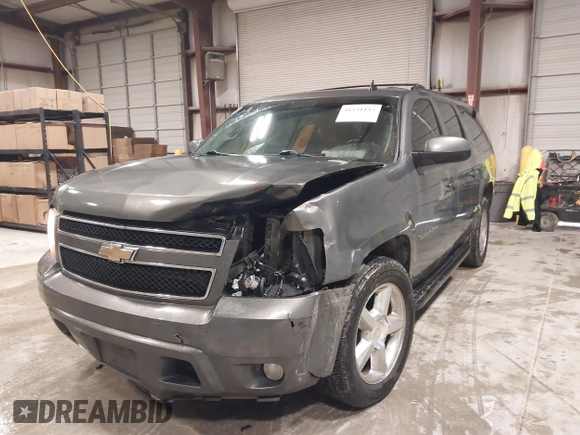 2011 Chevrolet Suburban LT with VIN 1GNSCJE0XBR180270, listed as a IAAI auction lot 41531193 with 202,493 mi miles. Bid and sale history available at carsss.com. Image 6.