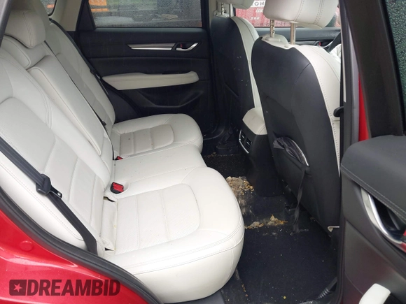 2019 Mazda CX-5 Grand Touring with VIN JM3KFBDM8K0693622, listed as a IAAI auction lot 42503818 with 60,812 mi miles and . Bid and sale history available at DreamBid. Image 8.