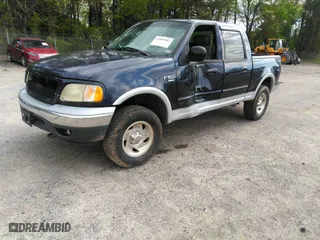 2001 Ford F-150 SuperCrew XLT with VIN 1FTRW08L71KF47826, listed as a IAAI auction lot 41855653 with 193,320 mi miles. Bid and sale history available at carsss.com. Image 18.