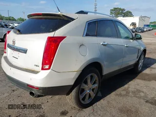 2014 Cadillac SRX Performance Collection with VIN 3GYFNCE36ES662689, listed as a IAAI auction lot 42109417 with 132,957 mi miles. Bid and sale history available at carsss.com. Image 4.