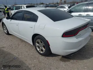 2015 Dodge Charger SE with VIN 2C3CDXBGXFH812015, listed as a IAAI auction lot 41869666 with 108,823 mi miles. Bid and sale history available at carsss.com. Image 3.