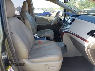 2014 Toyota Sienna XLE with VIN 5TDYK3DC6ES414892, listed as a IAAI auction lot 42545666 with 135,805 mi miles and . Bid and sale history available at DreamBid. Image 5.