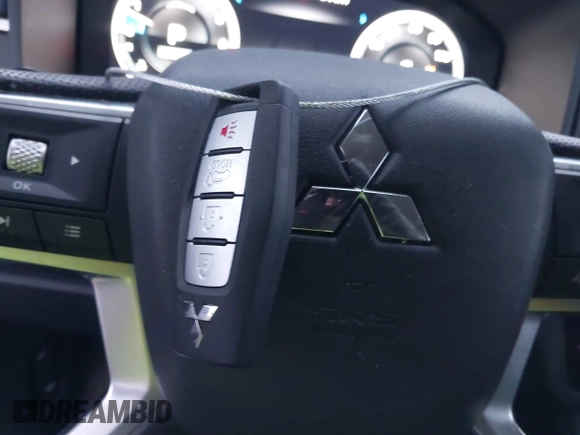 2022 Mitsubishi Outlander SE z VIN JA4J4UA8XNZ034643, wystawiony jako IAAI lot #41214966 z przebiegiem 52 827 mil mil oraz . Historia ofert i sprzedaży dostępna na DreamBid. Obrazek 11.