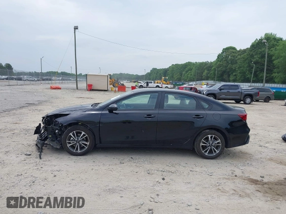 2023 Kia Forte LXS with VIN 3KPF24AD1PE594919, listed as a IAAI auction lot 42158476 with 34,719 mi miles and . Bid and sale history available at DreamBid. Image 14.