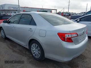 2012 Toyota Camry L with VIN 4T1BF1FK8CU080078, listed as a IAAI auction lot 42084382 with 165,894 mi miles and . Bid and sale history available at carsss.com. Image 3.