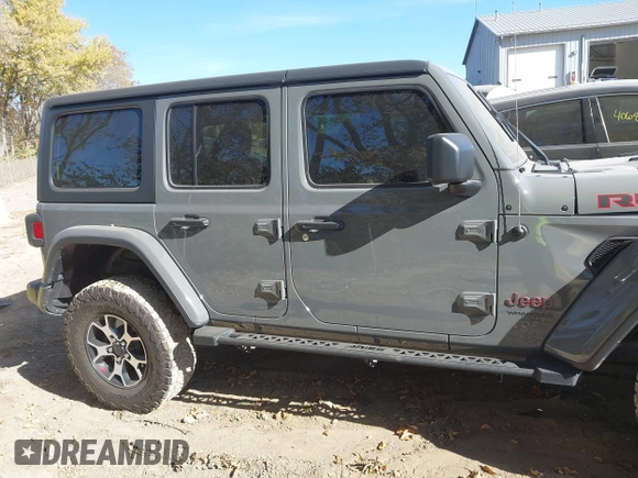 2019 Jeep Wrangler Unlimited Rubicon with VIN 1C4HJXFN7KW681365, listed as a IAAI auction lot 40686862 with 29,431 mi miles and . Bid and sale history available at DreamBid. Image 13.