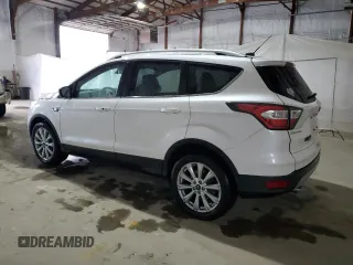 2017 Ford Escape Titanium with VIN 1FMCU0J96HUB31397, listed as a Copart auction lot 50970835 with 127,598 mi miles and Salvage Title. Bid and sale history available at carsss.com. Image 2.