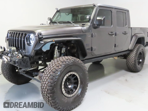 2023 Jeep Gladiator Freedom z VIN 1C6HJTAG2PL519578, wystawiony jako Copart lot #58429715 z przebiegiem 41 914 mil mil oraz Szkoda całkowita • Salvage title. Historia ofert i sprzedaży dostępna na DreamBid. Obrazek 2.