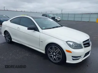 2014 Mercedes-Benz C-Class C 250 with VIN WDDGJ4HB9EG300827, listed as a IAAI auction lot 41676563 with 87,179 mi miles. Bid and sale history available at carsss.com. Image 1.