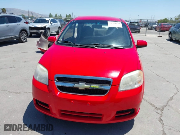 2011 Chevrolet Aveo 1LT z VIN KL1TD5DE0BB151956, wystawiony jako IAAI lot #42328720 z przebiegiem 115 765 mil mil oraz . Historia ofert i sprzedaży dostępna na DreamBid. Obrazek 13.