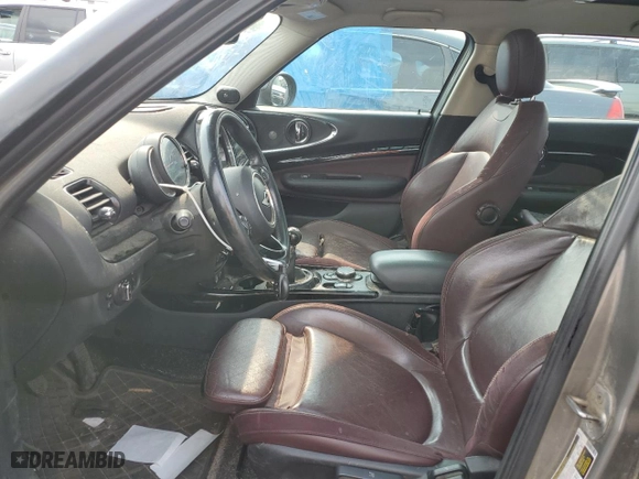 2017 MINI Clubman Cooper S with VIN WMWLU5C55H2F24329, listed as a Copart auction lot 67163314 with 129,818 mi miles and Salvage Title. Bid and sale history available at carsss.com. Image 7.