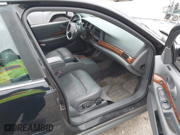 2003 Buick LeSabre Limited with VIN 1G4HR54K23U115628, listed as a IAAI auction lot 41819918 with 115,397 mi miles and . Bid and sale history available at carsss.com. Image 5.