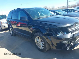 2017 Dodge Journey SXT with VIN 3C4PDCBG5HT505187, listed as a IAAI auction lot 41812581 with 136,259 mi miles and . Bid and sale history available at DreamBid. Image 13.