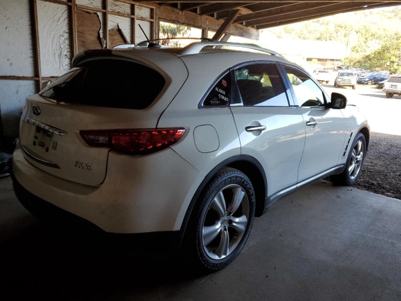 2010 Infiniti FX z VIN JN8AS1MU7AM800312, wystawiony jako Copart lot #46866455 z przebiegiem 181 761 mil mil oraz Szkoda całkowita • Salvage title. Historia ofert i sprzedaży dostępna na DreamBid. Obrazek 3.
