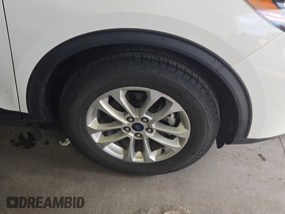 2020 Ford Escape SE with VIN 1FMCU9G68LUB25725, listed as a IAAI auction lot 42773960 with 91,597 mi miles and . Bid and sale history available at DreamBid. Image 34.