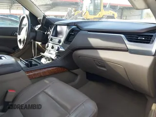2015 Chevrolet Suburban LTZ with VIN 1GNSCKKC2FR741040, listed as a IAAI auction lot 41709574 with 87,795 mi miles and . Bid and sale history available at DreamBid. Image 5.