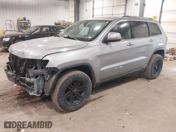 2015 Jeep Grand Cherokee Laredo with VIN 1C4RJFAG4FC797069, listed as a IAAI auction lot 41435299 with 146,755 mi miles. Bid and sale history available at carsss.com. Image 17.