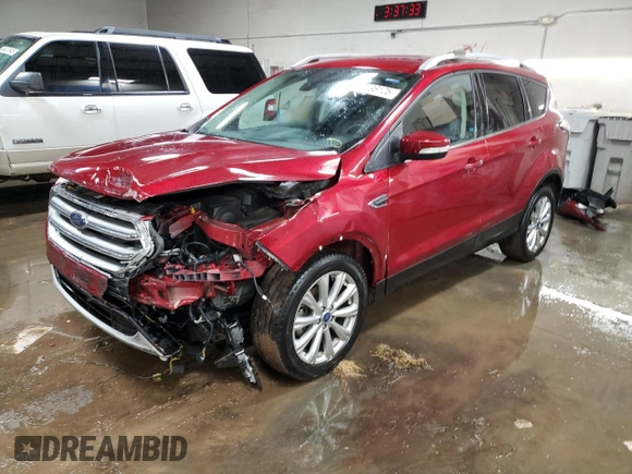 2017 Ford Escape Titanium with VIN 1FMCU0JD0HUE13538, listed as a Copart auction lot 49396125 with 36,733 mi miles and Salvage Title. Bid and sale history available at carsss.com. Image 1.