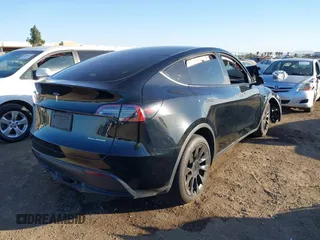 2023 Tesla Model Y Long Range with VIN 7SAYGDEE0PF907260, listed as a IAAI auction lot 41180227 with Not Provided miles and . Bid and sale history available at DreamBid. Image 4.