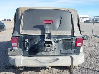 2009 Jeep Wrangler X with VIN 1J4FA24159L768617, listed as a IAAI auction lot 41686830 with 100,478 mi miles and . Bid and sale history available at DreamBid. Image 16.