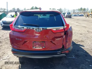 2018 Honda CR-V EX with VIN 2HKRW2H57JH604764, listed as a IAAI auction lot 41935099 with 156,459 mi miles and . Bid and sale history available at DreamBid. Image 16.