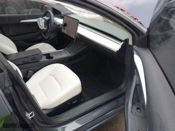 2022 Tesla Model 3 Long Range with VIN 5YJ3E1EBXNF138538, listed as a IAAI auction lot 41771647 with 31,250 mi miles. Bid and sale history available at carsss.com. Image 5.