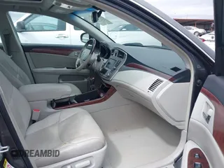 2012 Toyota Avalon with VIN 4T1BK3DB6CU459249, listed as a IAAI auction lot 41802571 with 147,955 mi miles. Bid and sale history available at carsss.com. Image 5.