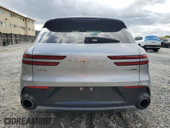 2023 Genesis GV70 Sport with VIN KMUMCDTC3PU098818, listed as a Copart auction lot 52884225 with 25,748 mi miles and Non Repairable. Bid and sale history available at DreamBid. Image 6.