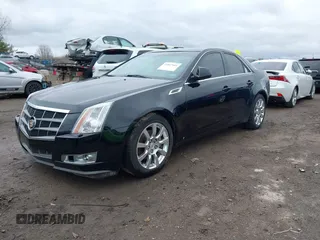 2008 Cadillac CTS RWD w/1SB with VIN 1G6DR57V580176739, listed as a IAAI auction lot 41847461 with 136,482 mi miles. Bid and sale history available at carsss.com. Image 2.