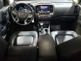 2022 GMC Canyon 4WD AT4 w/Leather with VIN 1GTG6FEN1N1175900, listed as a Copart auction lot 85957514 with 56,811 mi miles and Salvage Title. Bid and sale history available at carsss.com. Image 8.