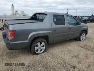 2009 Honda Ridgeline RTL z VIN 5FPYK16569B103645, wystawiony jako Copart lot #58300625 z przebiegiem 103 195 mil mil oraz Szkoda całkowita • Salvage title. Historia ofert i sprzedaży dostępna na DreamBid. Obrazek 3.