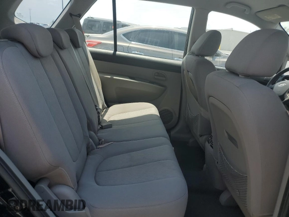 2009 Kia Rondo LX with VIN KNAFG528097250880, listed as a Copart auction lot 52632615 with 127,228 mi miles and Salvage Title. Bid and sale history available at carsss.com. Image 11.