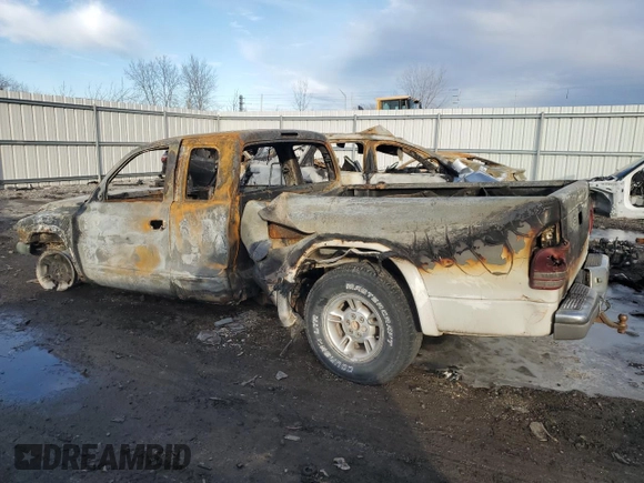 1999 Dodge Dakota SLT with VIN 1B7GL22X6XS263958, listed as a Copart auction lot 43553855 with 0 mi miles and Non Repairable. Bid and sale history available at carsss.com. Image 2.