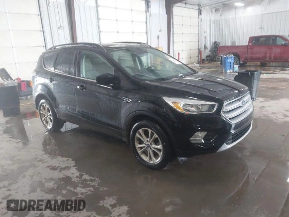 2018 Ford Escape SE with VIN 1FMCU0G99JUC89312, listed as a IAAI auction lot 41484138 with 149,739 mi miles. Bid and sale history available at carsss.com. Image 1.